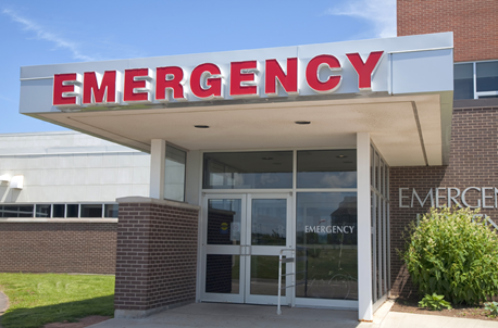 The exterior of an Emergency Department entrance at a hospital.
